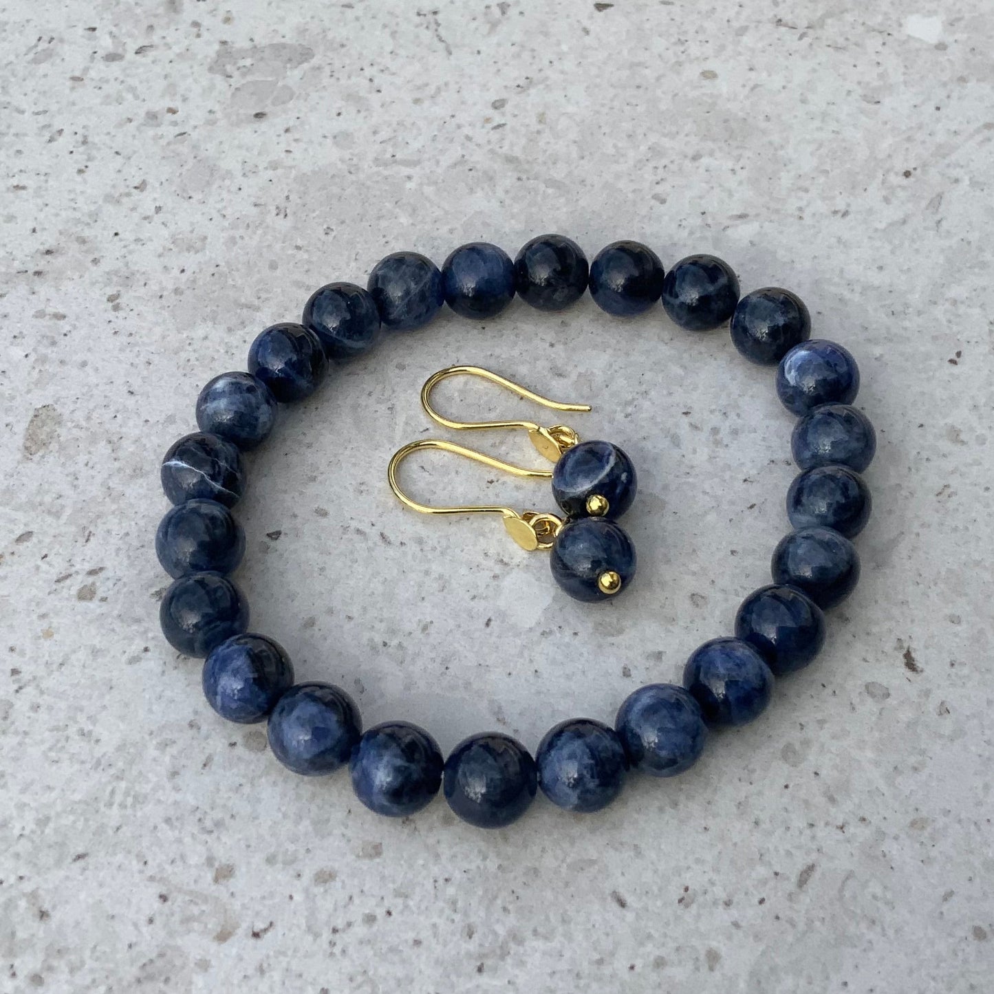 Armbånd og ørering i sodalit