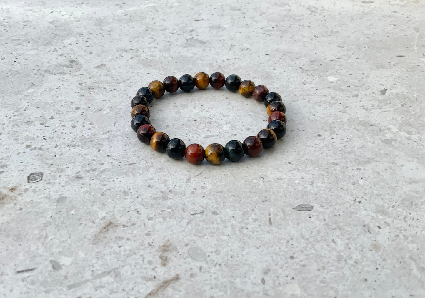 Armbånd og ørering i tigerøje